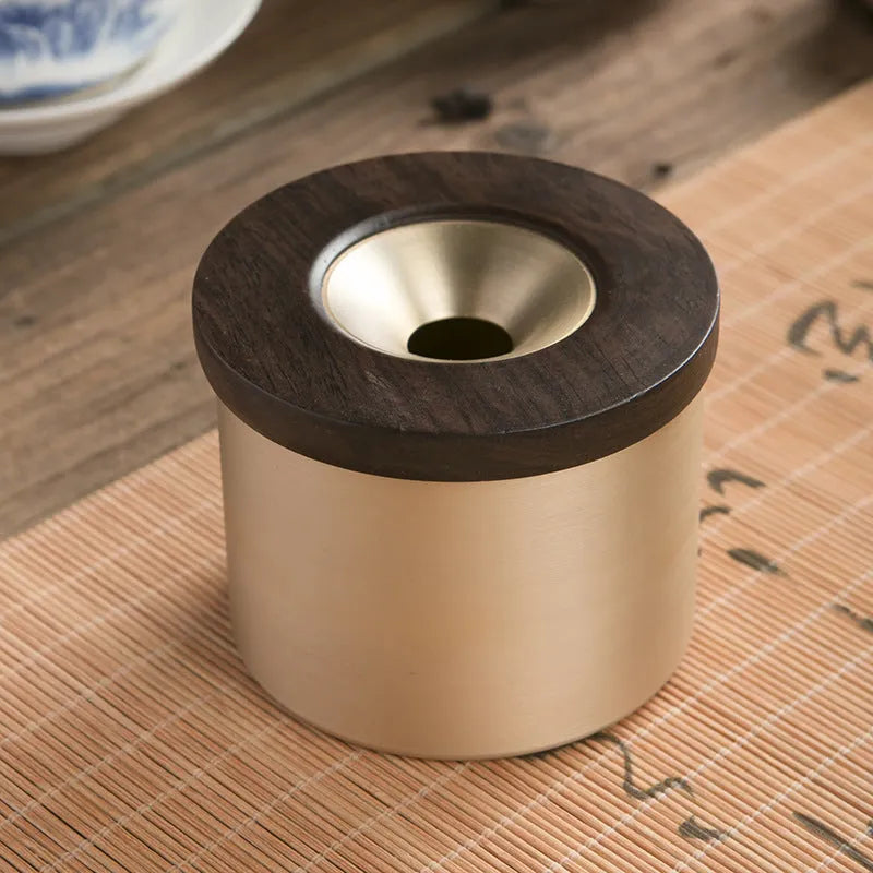 Retro solid copper ashtray with a wooden lid featuring a centre hole, shown with black and red wood options.