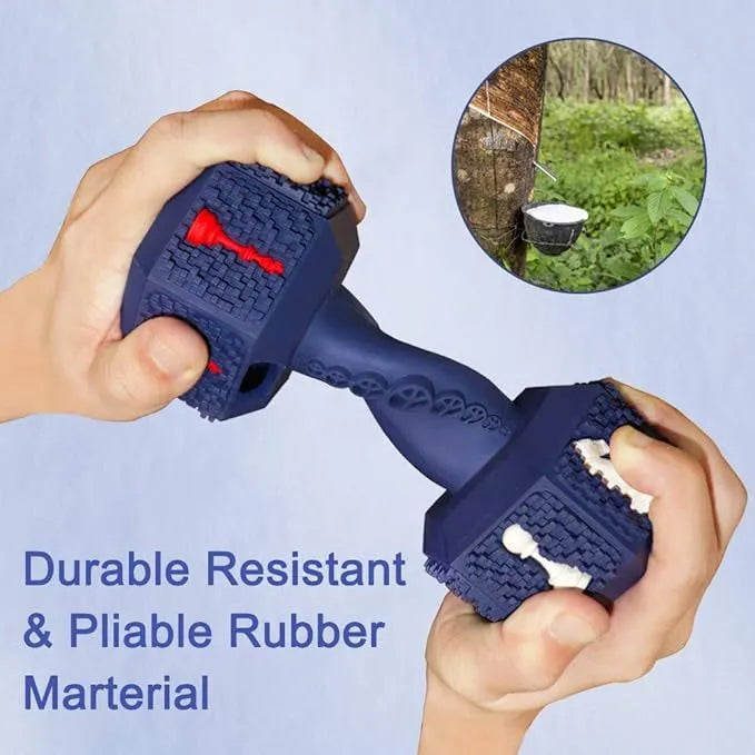 Heavy black rubber dumbbell dog chew toy with textured surface and hollow ends on a white background.