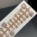 Pink cat-eye toenail covers 42-piece set with gilding icy finish on toes
