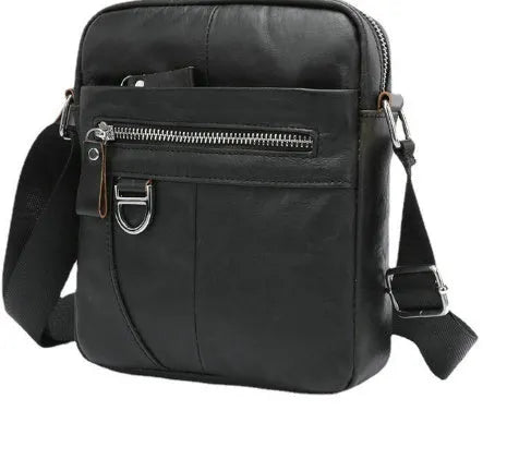 Black leather messenger bag with crossbody strap and visible sewing lines