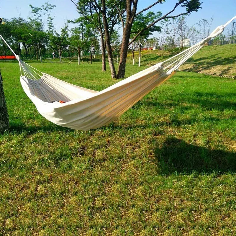 Cotton camping hammock with tree strap for outdoor backpacking and garden relaxation