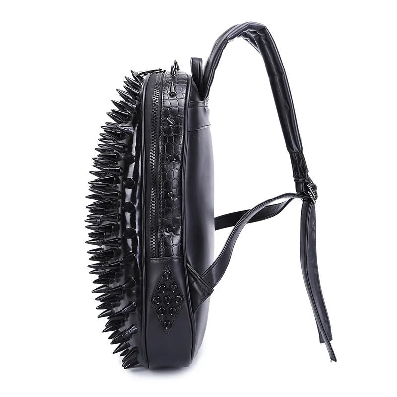 Black punk style women's backpack with air cushion straps and a zippered opening.
