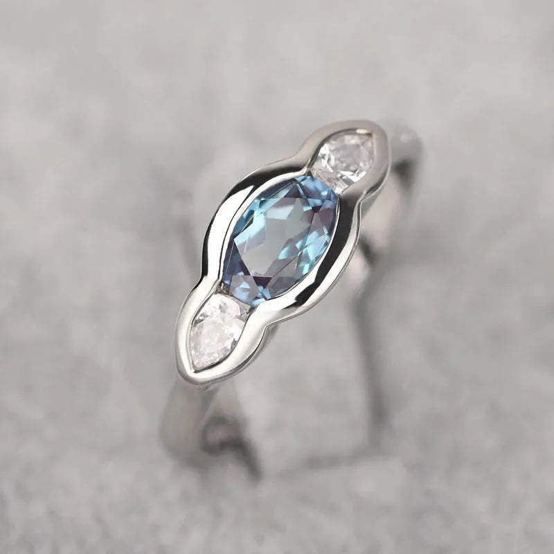 Geometric ellipse women's ring with white gold plating and inlaid zircon stones