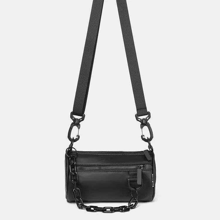 Black casual messenger bag with chain detail and crossbody strap made from Oxford cloth.