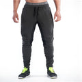 Men's slim-fit cotton sweatpants in grey black with elastic waistband and tapered leg