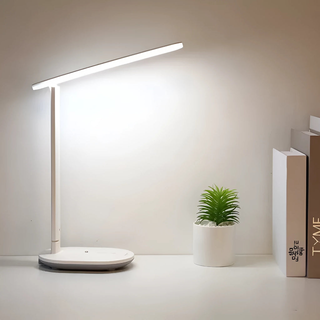 White LED charging table lamp with touch switch and ABS shade on a desk