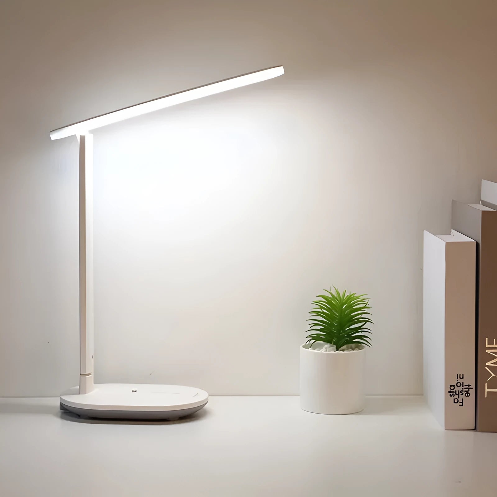 White LED charging table lamp with touch switch and ABS shade on a desk