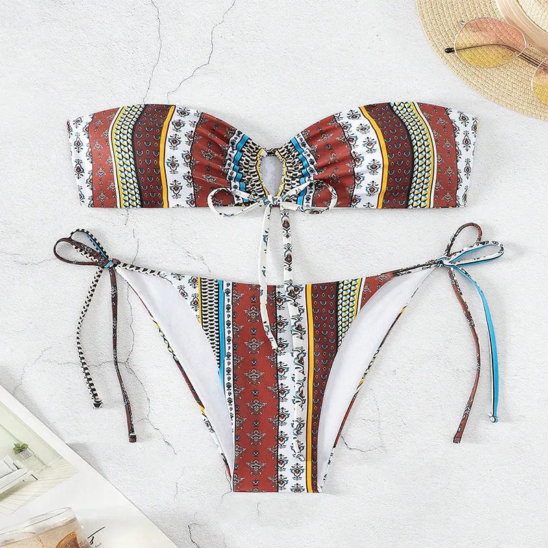 Women's mixed colour printed swimsuit with lace-up front and split leg design