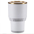 White aluminium car cup holder heater cooler with top ring buttons, resting in vehicle cup holder slot
