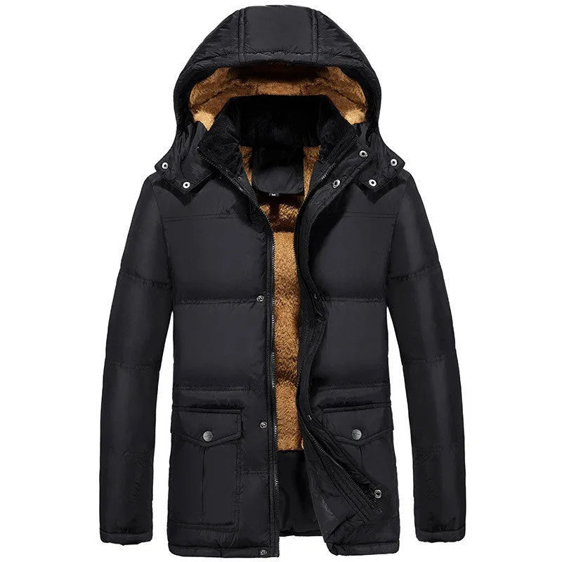 Man wearing a black hooded, double-breasted padded jacket with a velvet lining.