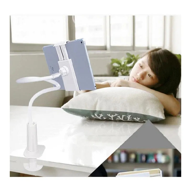 Black flexible magnalium phone and tablet mount holder with suction base on a table
