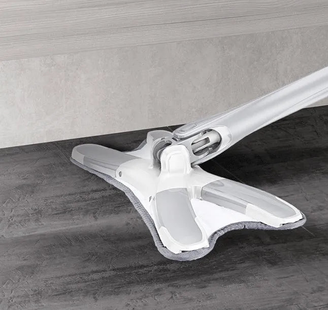 White hand-free flat mop with ABS head and metal pedal next to plastic basket