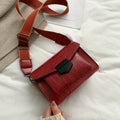 Vintage PU leather crossbody bag shown in black, dimensions 20cm by 14cm.