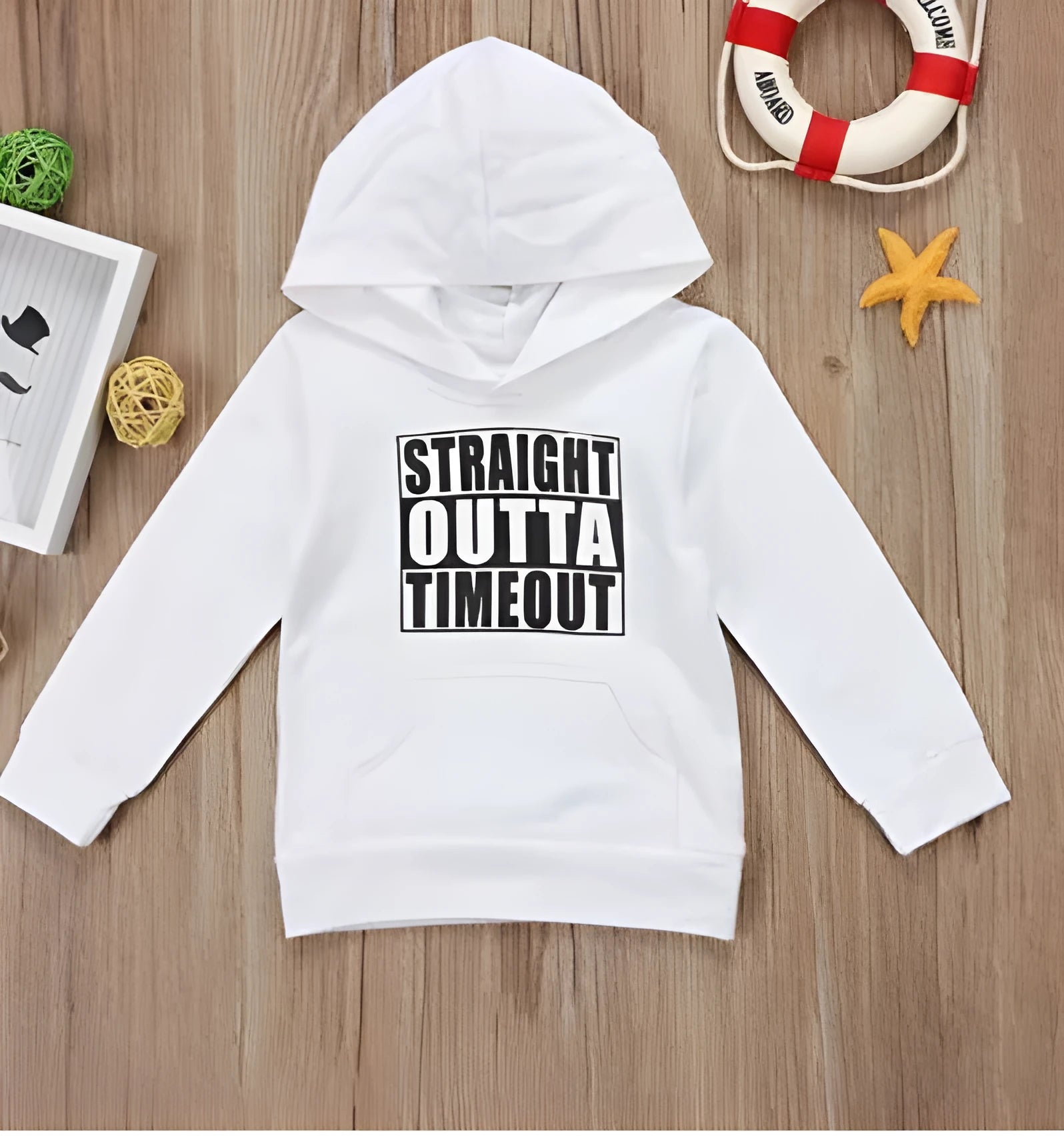 Children's black hooded sweater with white letter pattern, long sleeves, and pullover design.