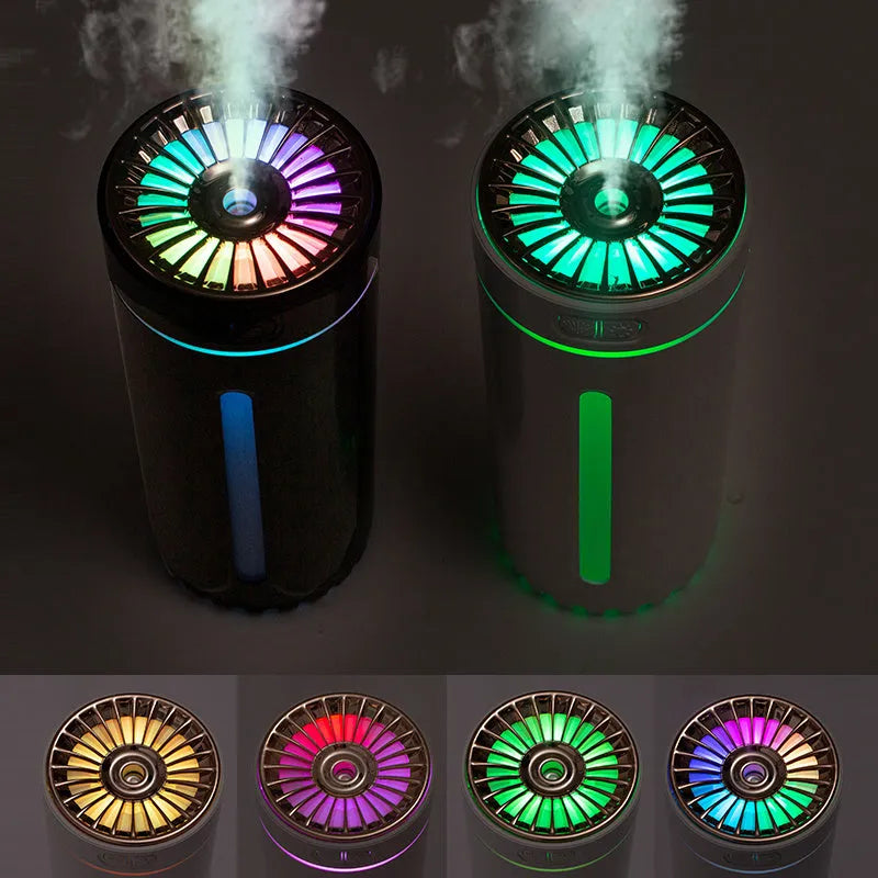 Black USB rechargeable car humidifier with colourful lights showing mist output, sized for cup holders