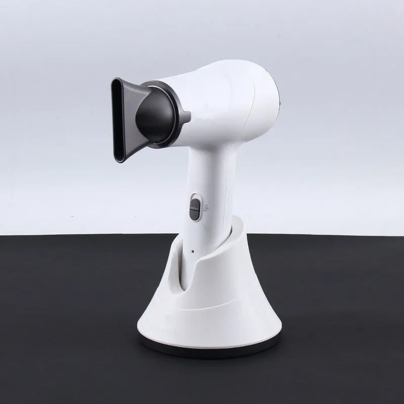Wireless hair dryer in gray with two speed buttons and UK plug, for dormitory or outdoor use