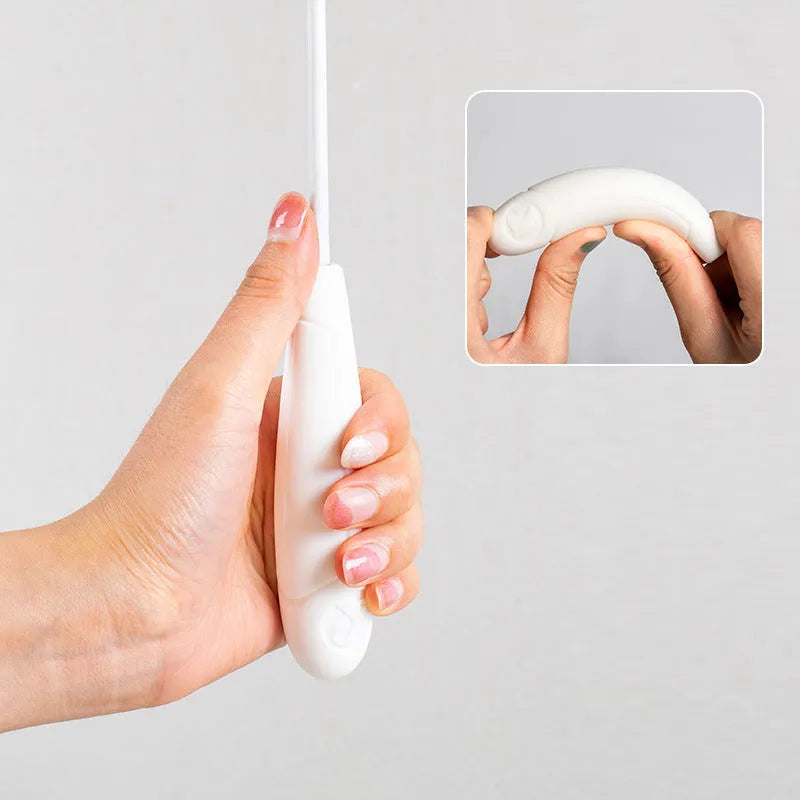 White telescopic fishing rod cat toy extended, with goose feather attachments and a small bell, on a neutral background.
