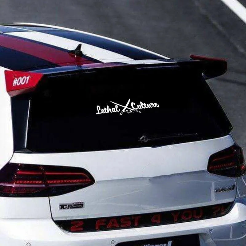 Yellow and white car rear windscreen vinyl sticker showing family member letters and numbers.