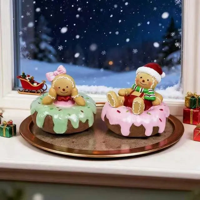 Hand drawn cartoon resin gingerbread man Christmas ornament with pink donut motif on white background