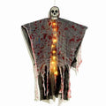 Plastic Halloween hanging ghost ornament with luminous blood-dyed skull.