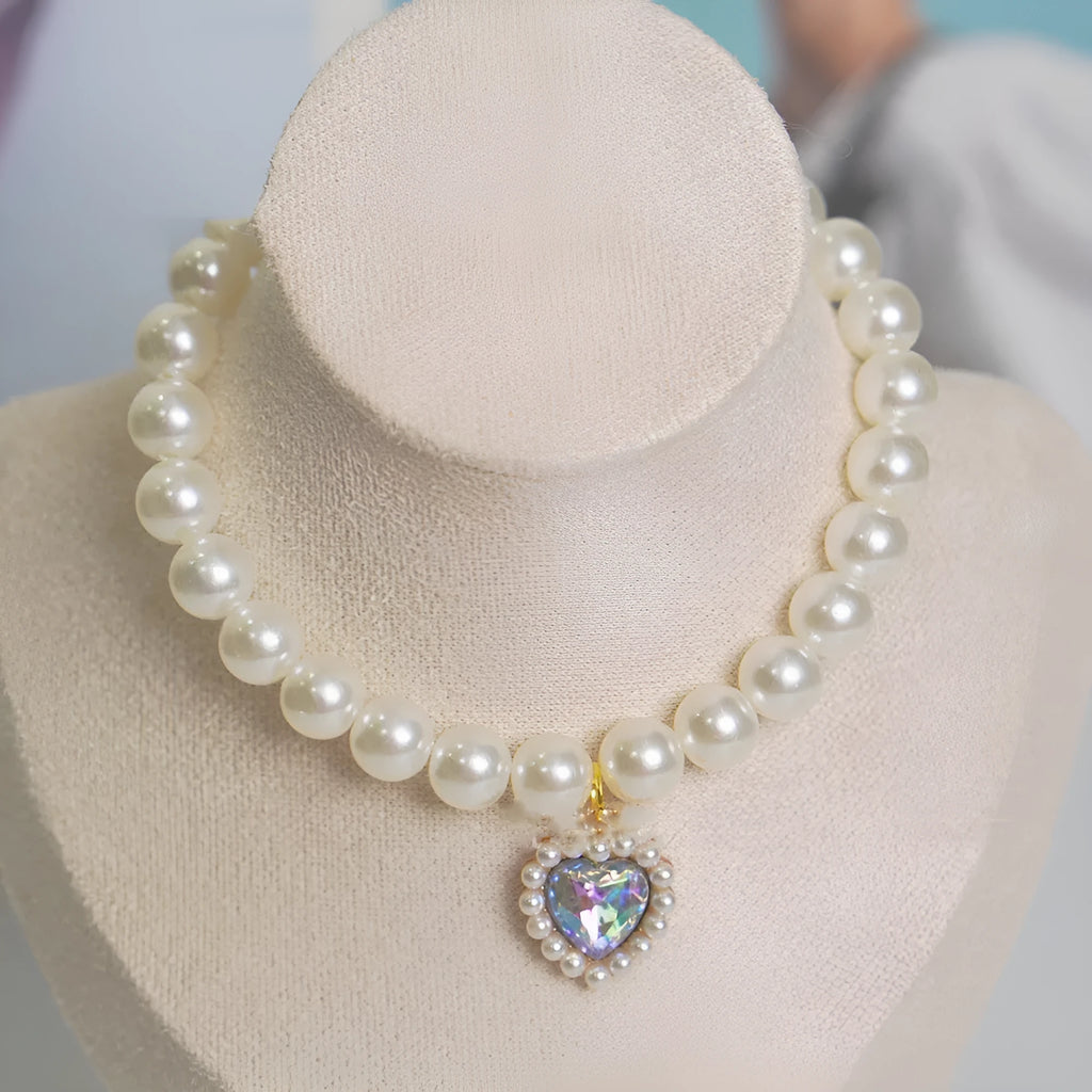 Decorative cat collar with plastic alloy resin construction and central gemstone charm in multiple colour options