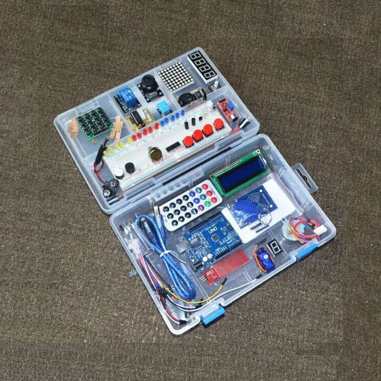 RFID upgraded Arduino starter kit with stepper motor, UNO board, breadboard, LCD and various sensor modules on a table