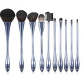 Small waist makeup brush set with nylon bristles and plastic handles in light blue, red, rose gold, and light colours