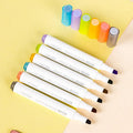 Deli S605 oblique head highlighter pen set showing macaron colour options with transparent penholders