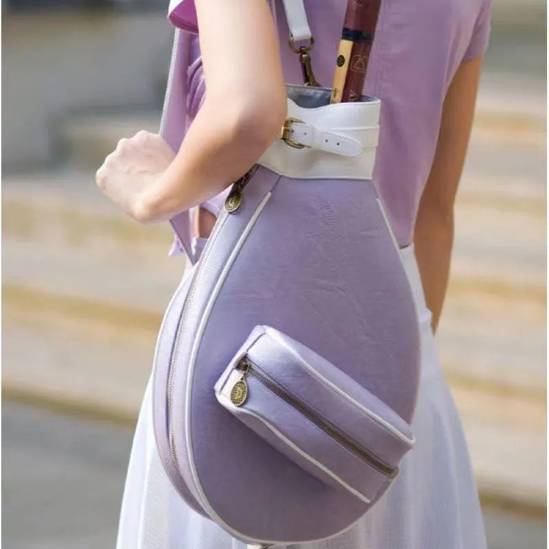 Retro leather badminton bag for women with a single shoulder strap, shown in purplish white colour.
