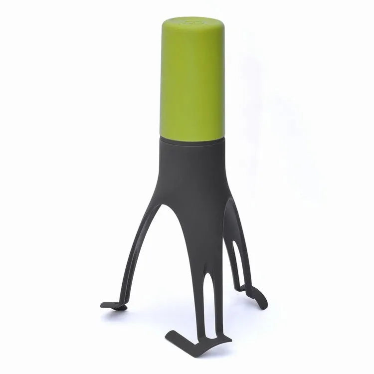 Green and grey automatic cooking mixer device for stirring sauces and soups.