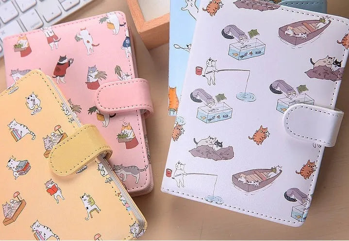 King Valley Ukiyoga large 32K creative cartoon magnetic buckle notebook in blue with cartoon cover and open pages