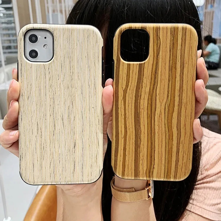 A natural wooden mobile phone case for iPhone, shown in rosewood colour on a table.
