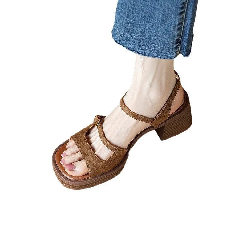 Women's beige open toe square toe retro platform sandals with a rubber sole.