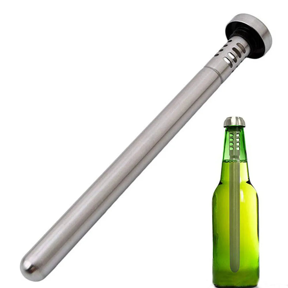 Stainless steel wine cooling rod and pourer in silver, with a bottle of red wine