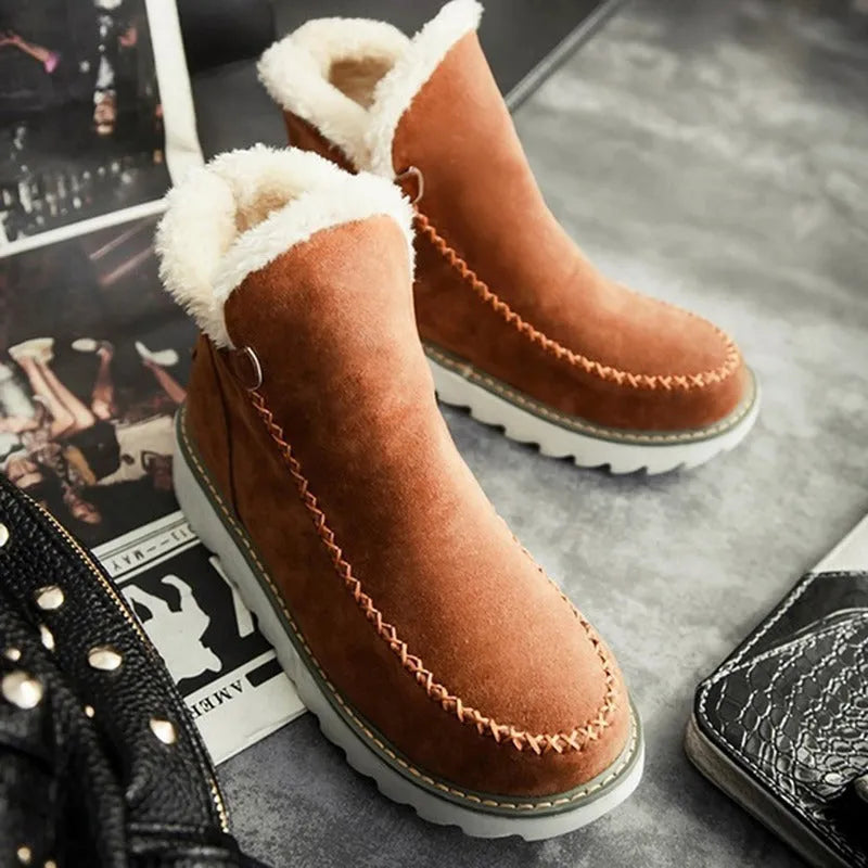 Women's winter snow boots in black with plush flannel lining, rubber sole, mid heel, round toe, ankle-high.