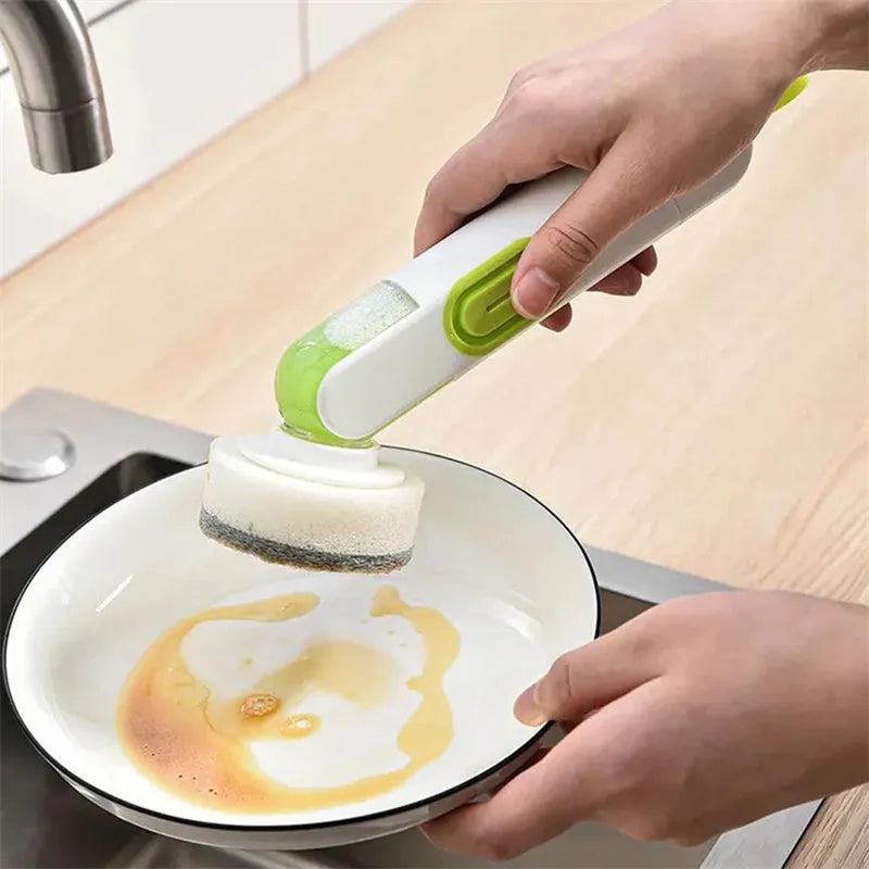 White and red long-handle cleaning brush with liquid dispenser and two brush heads for kitchen use