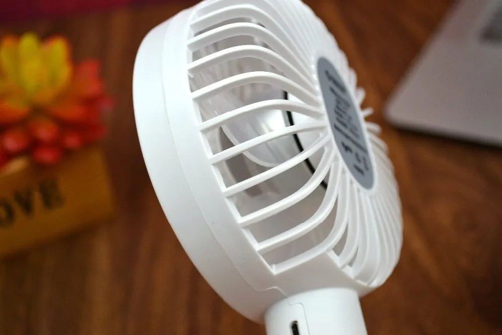 White ORICO FH1 USB rechargeable portable desktop fan with three-speed settings.