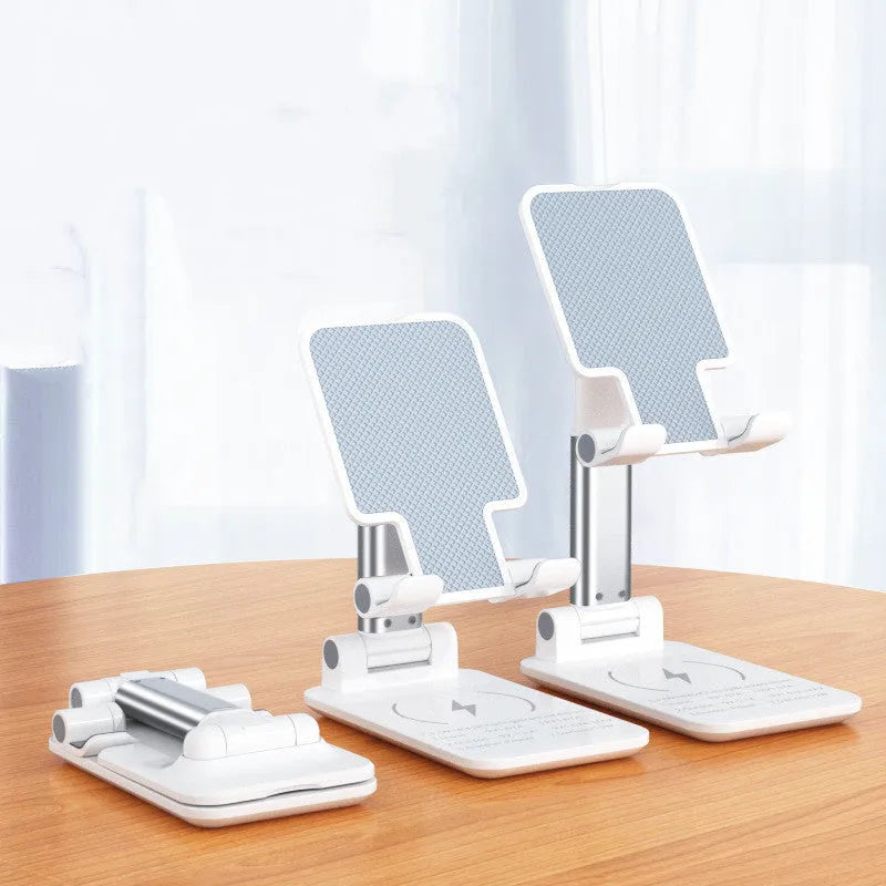 Cool black desktop wireless charging stand holding a mobile phone upright.