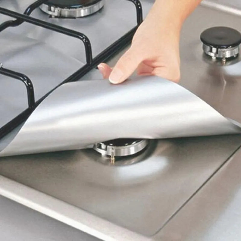 Gas stove surface protection pad made of Teflon-coated glass fibre cloth in black, measuring 27 x 27cm