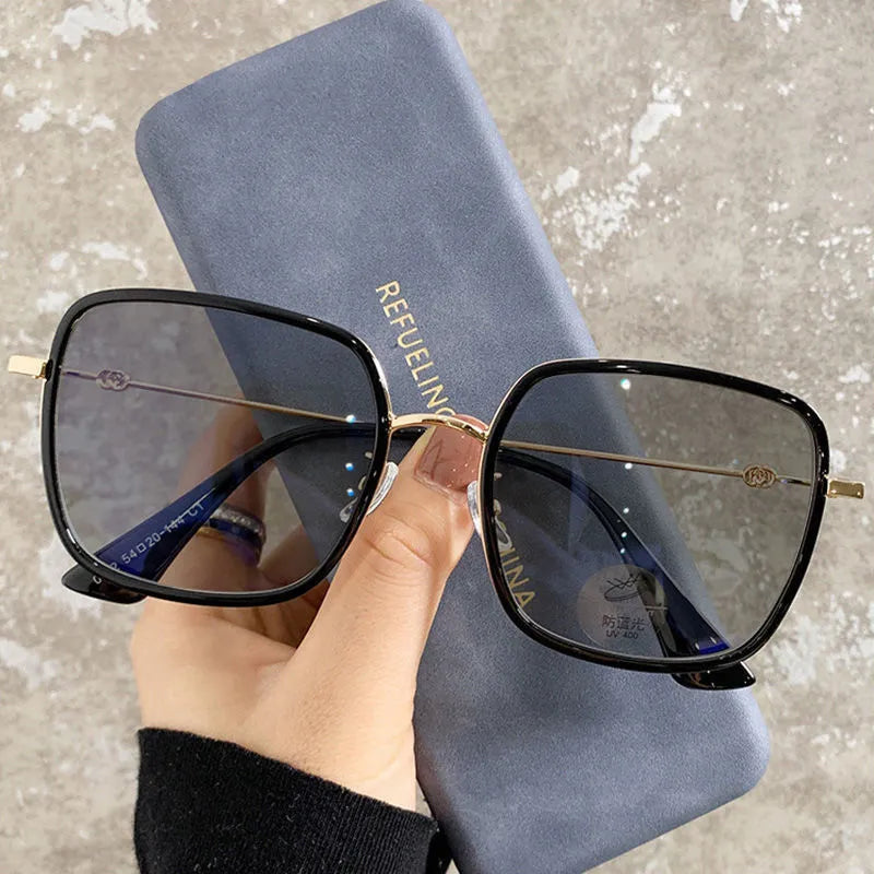 Photochromic myopia glasses with large frame, anti-blue light lens, available in four black gold frame colours