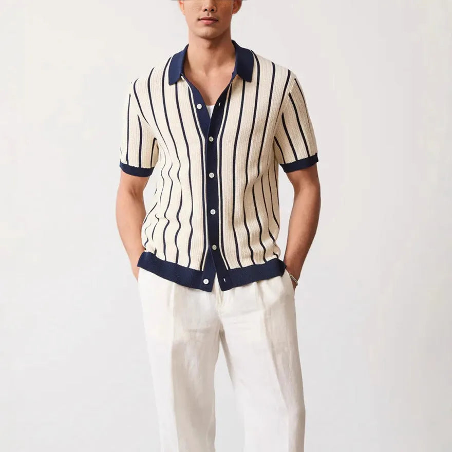Men's white British style knitted short sleeve top with lapel and asymmetric stripes.