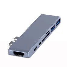 Dual Type-C seven-in-one hub in aluminium-magnesium alloy with HDMI and USB ports, 12.7cm long