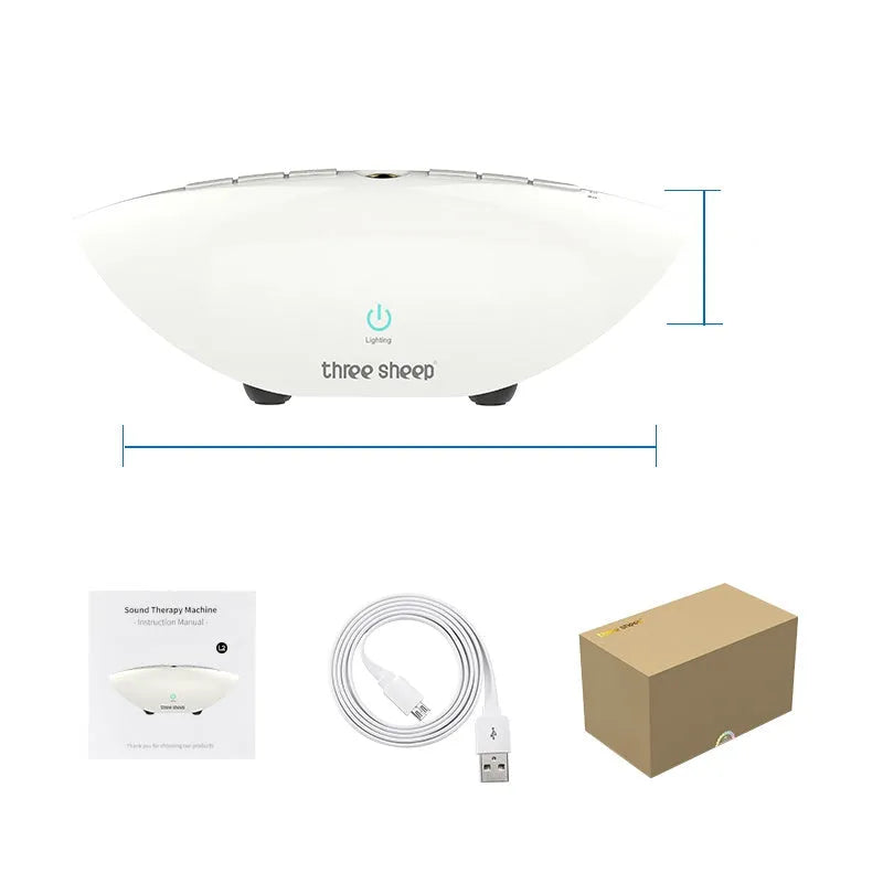 White noise sleep aid machine with mechanical buttons in white finish showing timer and volume controls