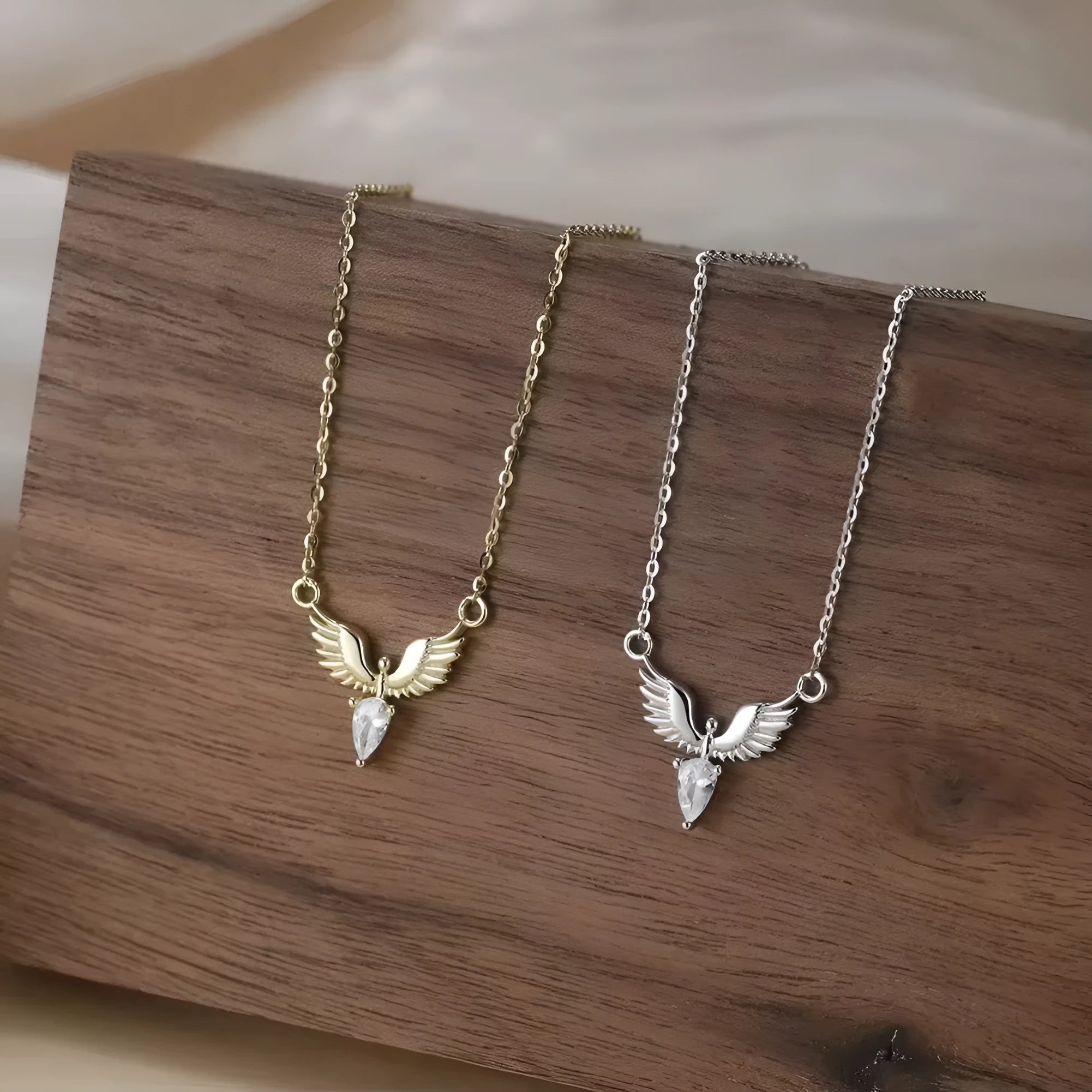 Women's sterling silver eagle pendant necklace on an adjustable O-ring chain in white gold colour.