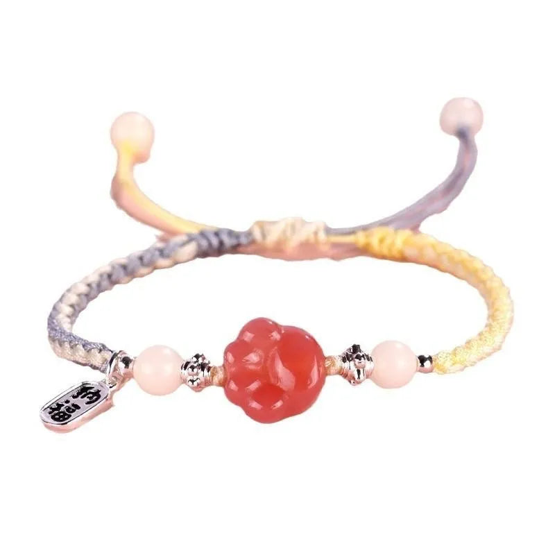 Handmade red cat's paw charm bracelet woven with pink or yellow glass beads in a pastoral couple's style.
