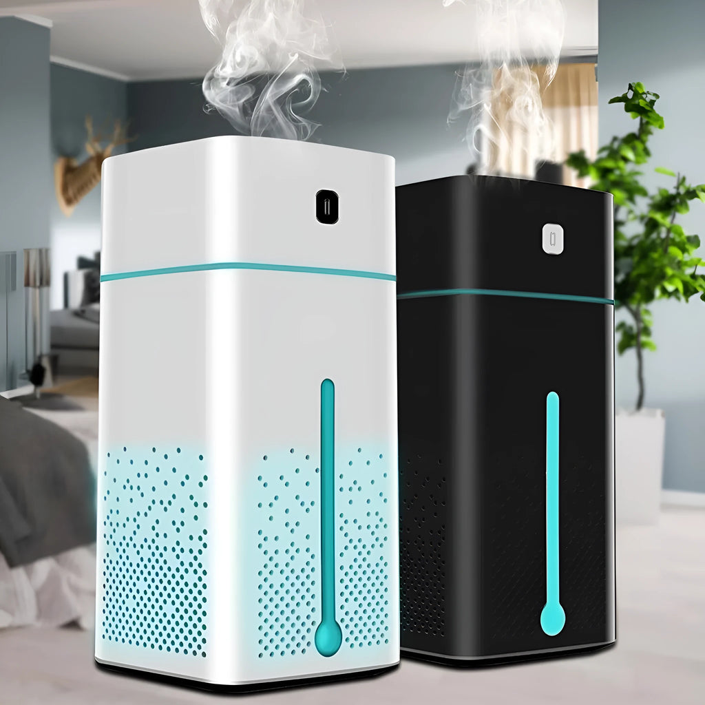 A compact black or white desktop humidifier with USB cable, standing 218mm tall on a wooden desk.