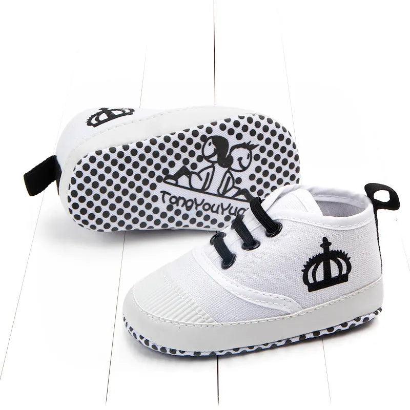 Red and white cotton canvas toddler shoes with elastic band closure in three size options