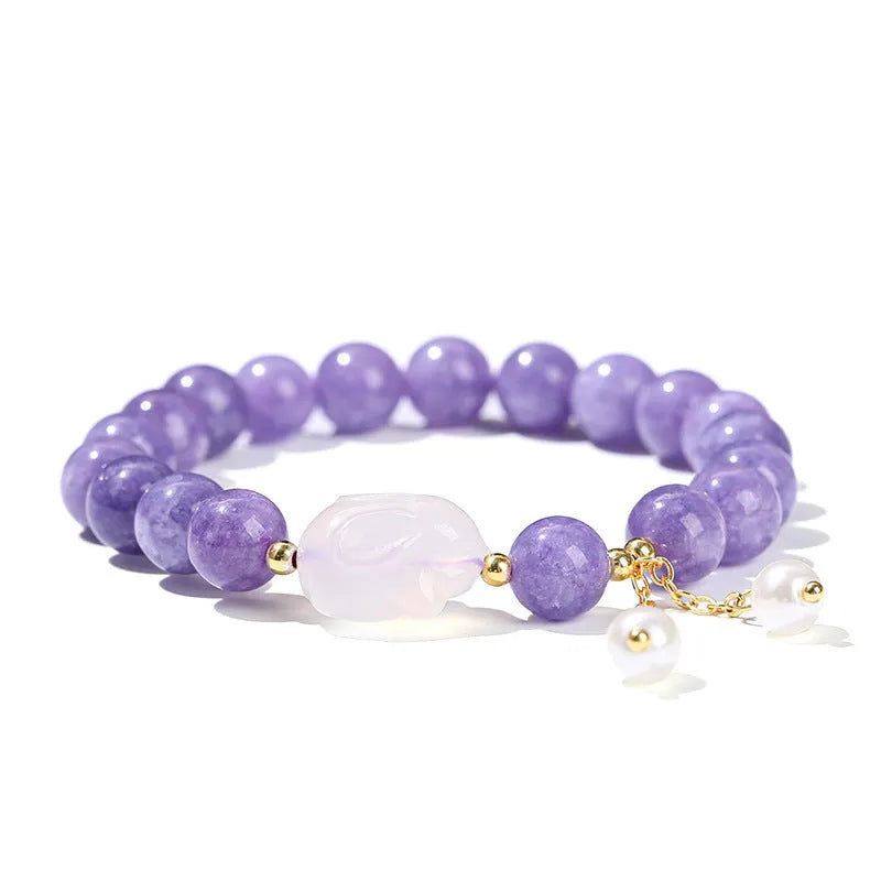 Purple geometric bracelet with aquamarine and lychee jelly agate beads in 6mm, 8mm, and 12x16mm sizes.
