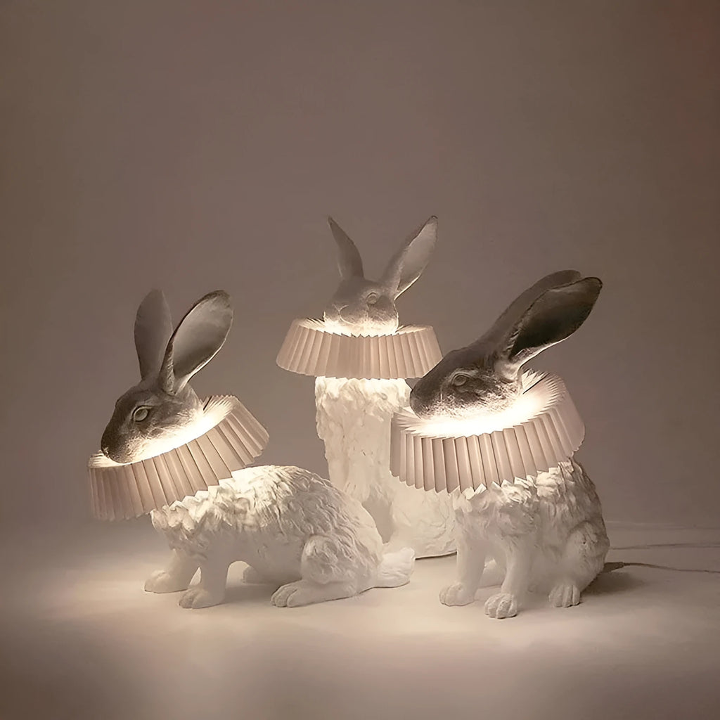 Modern customisable bedside lamp with choice of white or black rabbit silhouette designs.