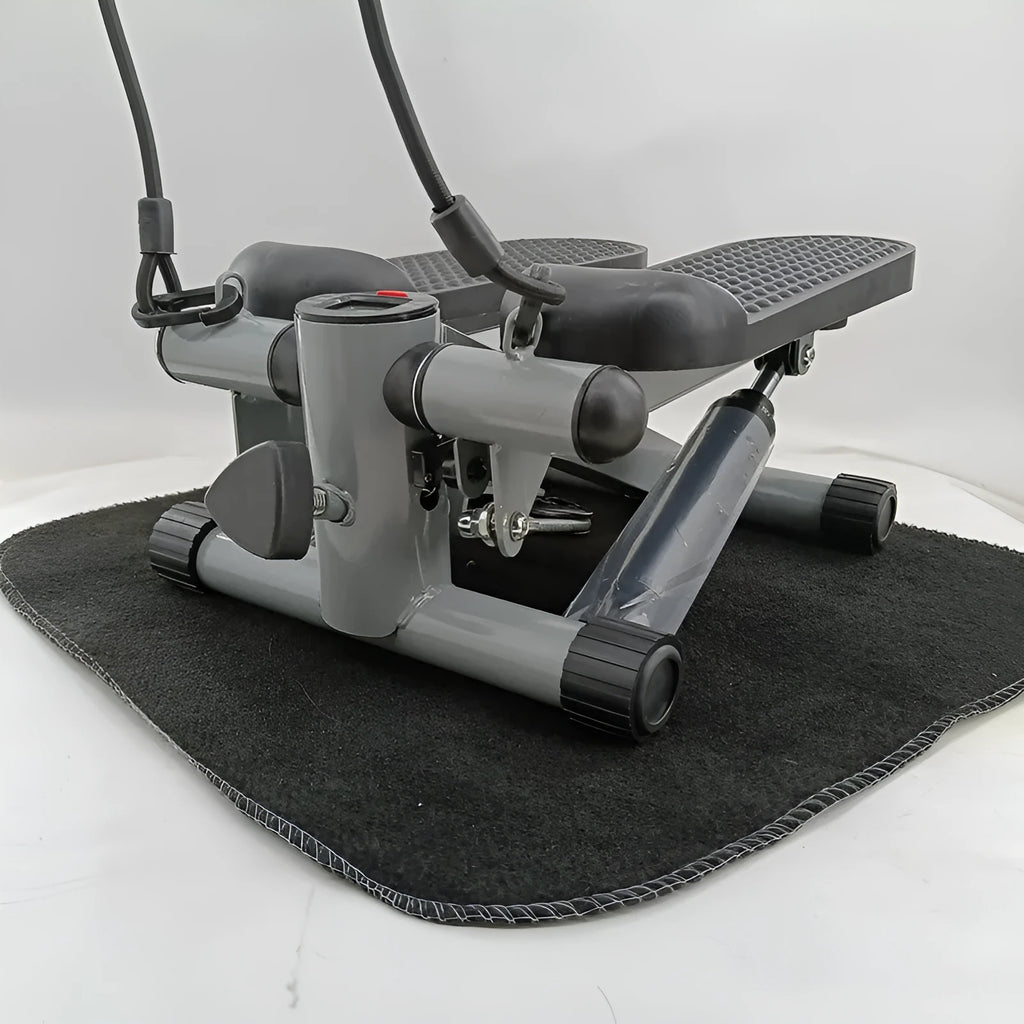 Silver grey hydraulic resistance mini treadmill pedal exerciser for home waist slimming.